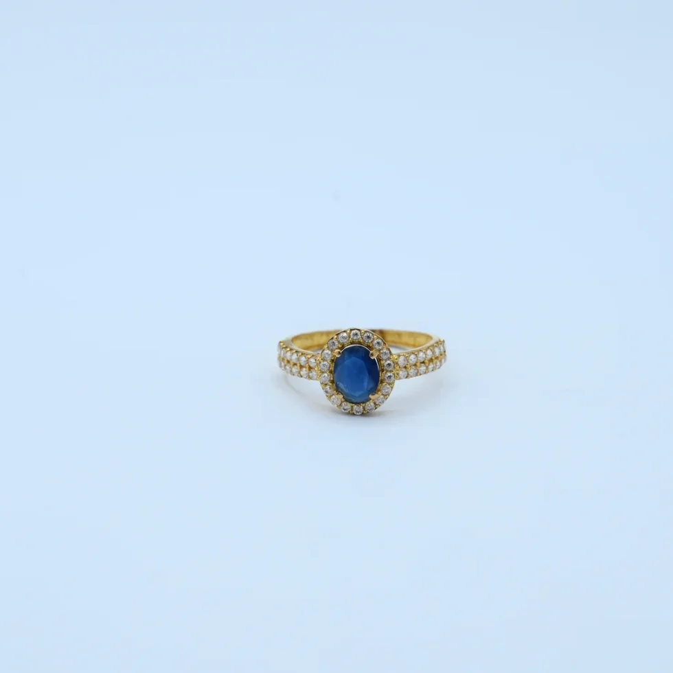 Gold Oval Sapphire Halo Ring
