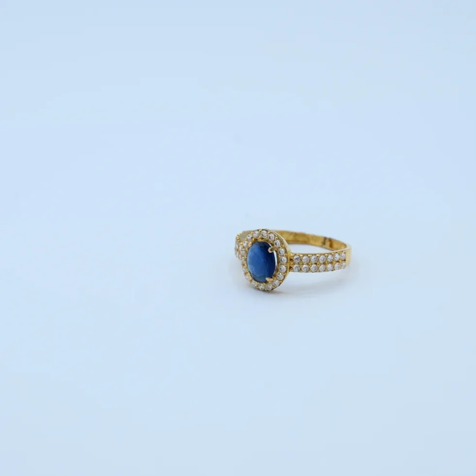 Gold Oval Sapphire Halo Ring