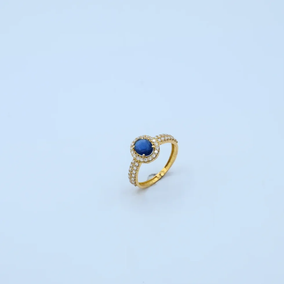 Gold Oval Sapphire Halo Ring